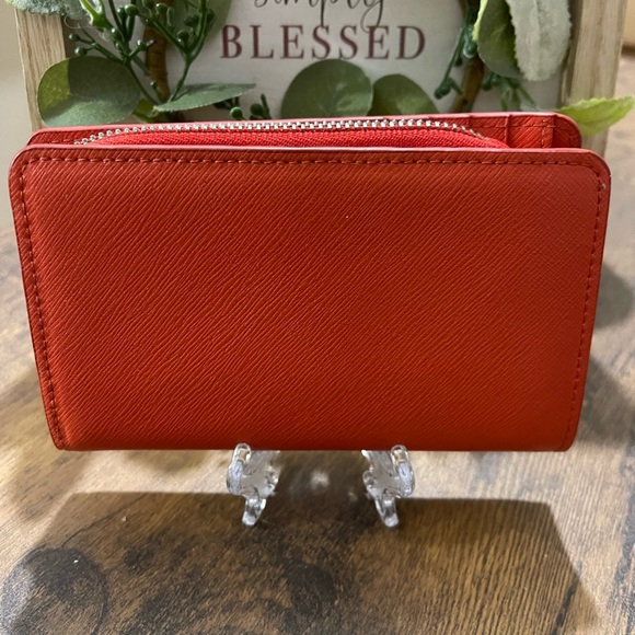 Furla Women's Wallet
EUC
Color: orange - Picture 2 of 10